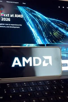 Amd logo on device with flowing data background Foto stock