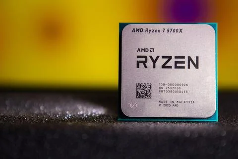 Amd ryzen 5700x processor close-up with colorful background Stock Photos