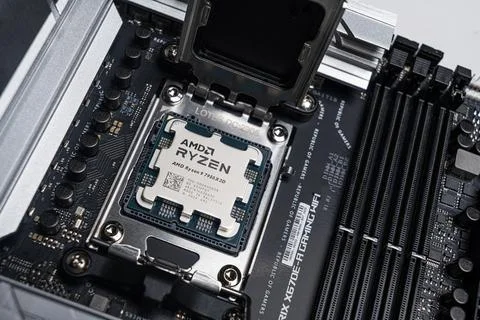 AMD Ryzen 9 7950X3D processor before being installed on the motherboard. Stock Photos