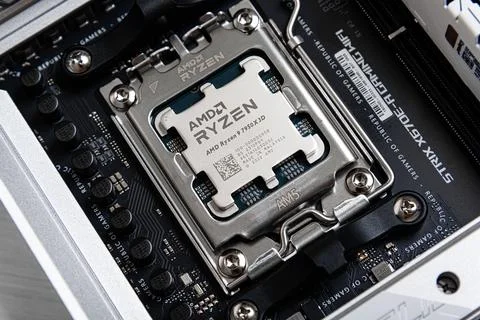 AMD Ryzen 9 7950X3D processor before being installed on the motherboard. Stock Photos