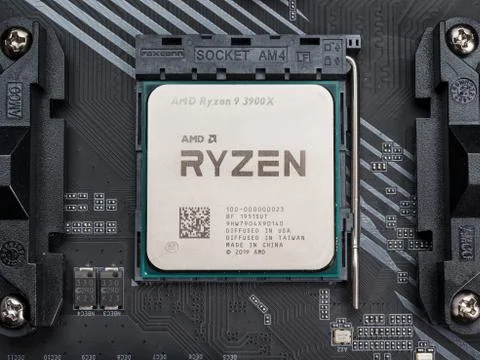 AMD Ryzen 9 CPU in AM4 socket top view Stock-Fotos