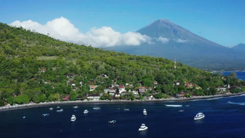 Amed village in Bali with Mount Agung Stock Footage