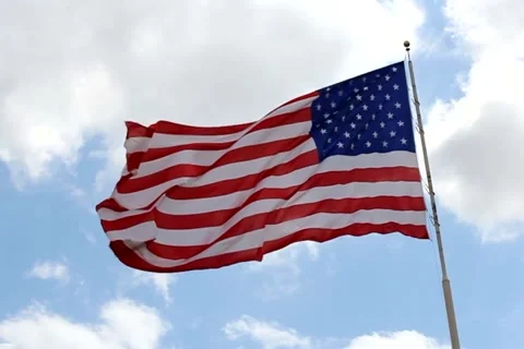 Amercan Flag Blowing in Wind Stock Footage 5512601