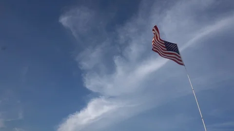 America Flag Blowing in the wind Stockbeeldmateriaal 98909784