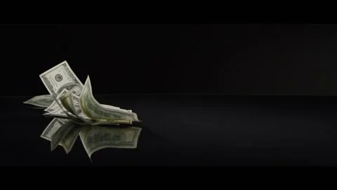 American $100 Bills Falling onto a Reflective Surface 스톡 동영상 201530517