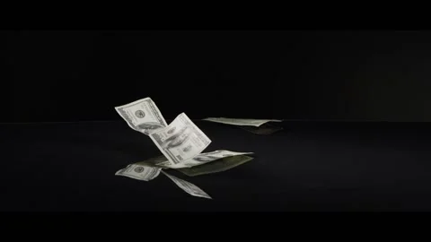 American $100 Bills Falling onto a Reflective Surface 스톡 동영상 201533079