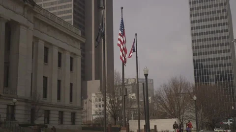 American and Ohio State Flags in front of Ohio Statehouse Stock Footage 148693765