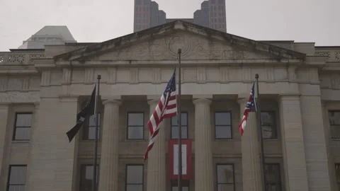 American and Ohio State Flags in front of Ohio Statehouse Stock Footage 148694404