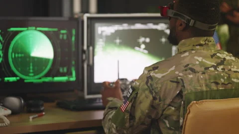 American army drone pilot training with advanced control systems in command hub Stock Footage 335538776