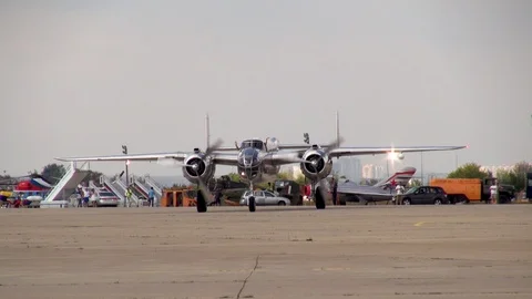 American B-25 Mitchell bomber steers into parking lot after landing. Close-up. Stock Footage 118896574