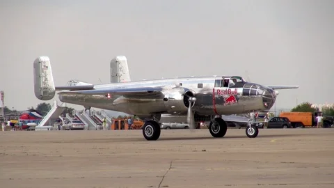 American B-25 Mitchell bomber steers into parking lot after landing. Close-up. Stock Footage 118896680