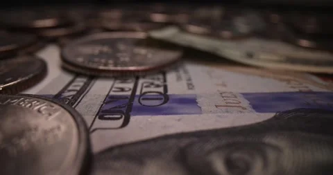 American banknotes and coins on table slow motion 4k movie Vídeos de archivo 257293248
