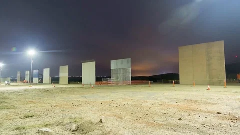 American Border Wall  - Time lapse of Mexican Border Wall Prototype Being Built Stock Footage 97855726