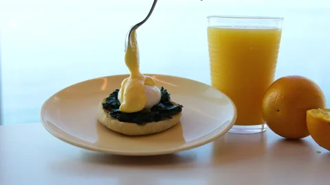 American breakfast with sunny side up eggs, bacon, toast, pancakes, coffee and Stock Footage 316250638