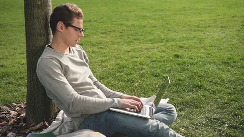 American brunet developer start working on project, sitting with computer. Stock Footage 99053535