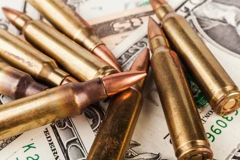 American Bullets on Dollars Stock Photos