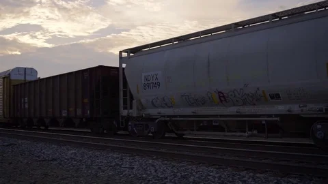 American Cargo Train at Sunset Slow Motion Stock Footage 78894240