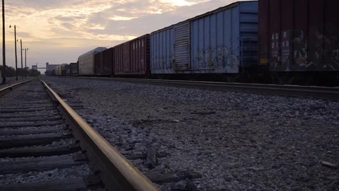 American Cargo Train at Sunset Slow Motion Stock Footage 78894248