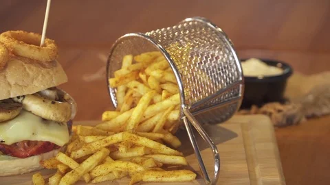 American cheeseburger with cheese, beef, tomato, lettuce and mushrooms. Stock Footage 80262167