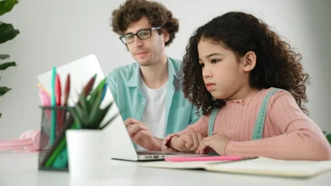 American daughter learning to coding and writing engineering prompt. Pedagogy. Stock Footage 271025855