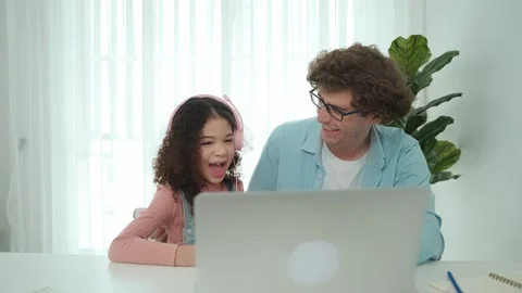 American daughter learning to coding and writing engineering prompt. Pedagogy. Stock Footage 275415685