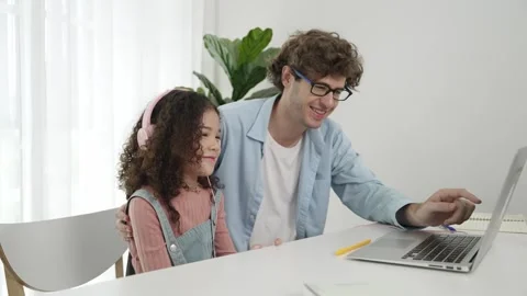 American daughter learning to coding and writing engineering prompt. Pedagogy. Stock Footage 277027367