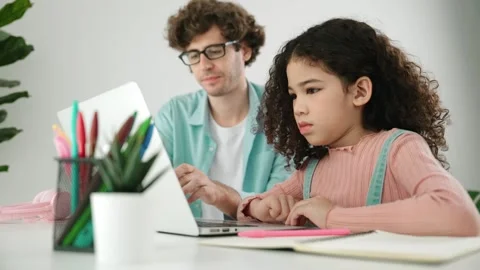 American daughter learning to coding and writing engineering prompt. Pedagogy. Stock Footage 278332976