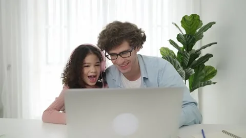 American daughter learning to coding and writing engineering prompt. Pedagogy. Stock Footage 281683549