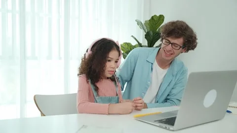 American daughter learning to coding and writing engineering prompt. Pedagogy. Stock Footage 283591277