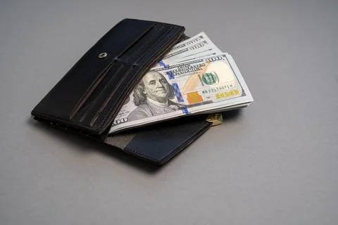 American dollar banknotes stack, pack of money in black wallet, rich, luxury Stock Photos