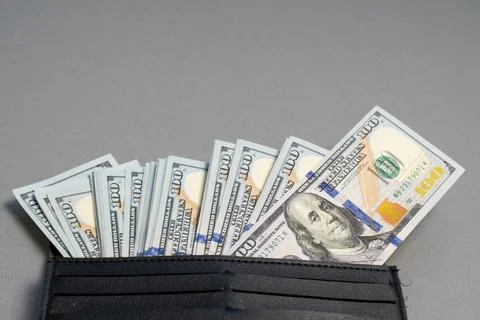 American dollar banknotes stack, pack of money in black wallet, rich, luxury Stock Photos