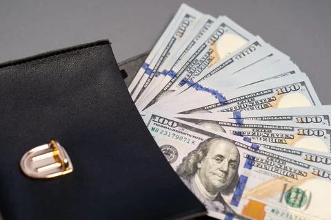 American dollar banknotes stack, pack of money in black bag, rich, corruption Stock Photos