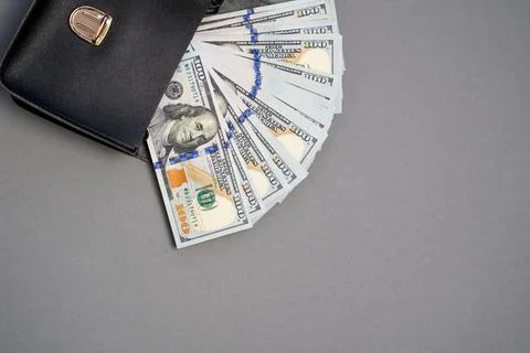 American dollar banknotes stack, pack of money in black bag, rich, corruption Stock Photos