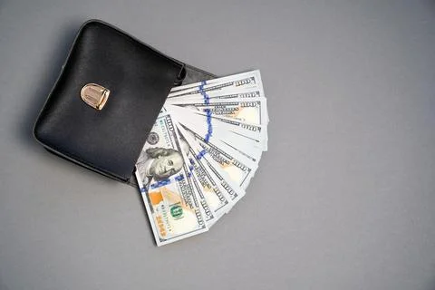 American dollar banknotes stack, pack of money in black bag, rich, corruption Stock Photos