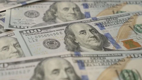 American dollar banknotes on table slow tilt Stock Footage 77731784