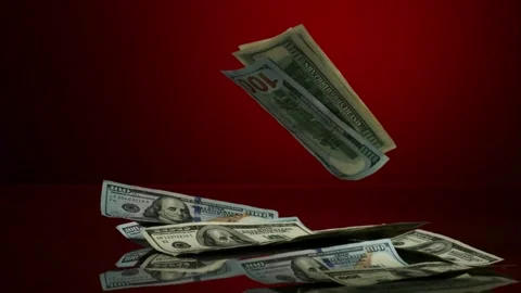 American dollar bills falling on red surface Stock Footage 327123043