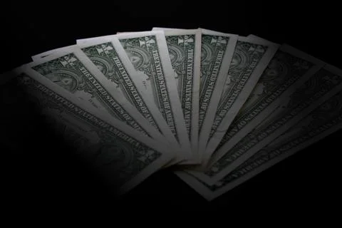 American  dollar isolate on black background Stock Photos