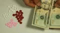 American Dollar USD, Counting Drugs and Money, Health Care, Colorful Pills HD Footage