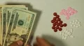 American Dollar USD, Counting Drugs and Money, Health Care, Colorful Pills HD Footage