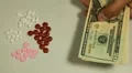 American Dollar USD, Counting Drugs and Money, Health Care, Colorful Pills HD Footage