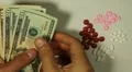 American Dollar USD, Counting Drugs and Money, Health Care, Colorful Pills HD Footage