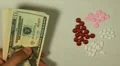 American Dollar USD, Counting Drugs and Money, Health Care, Colorful Pills HD Footage