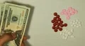 American Dollar USD, Counting Drugs and Money, Health Care, Colorful Pills HD Footage