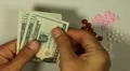 American Dollar USD, Counting Drugs and Money, Health Care, Colorful Pills HD Footage