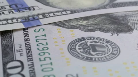 American dollars close up on a rotating table macro Stock Footage 306067644