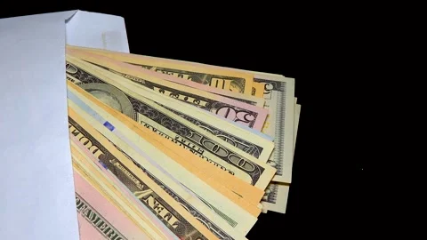 American dollor in a white cover counts banknotes with his hand Stock Footage 234140530