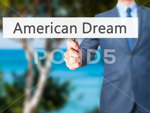 American Dream - Businessman hand holding sign Stock Photos