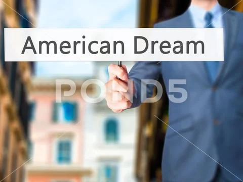 American Dream - Businessman hand holding sign Stock Photos