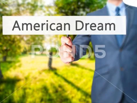 American Dream - Businessman hand holding sign Stock Photos