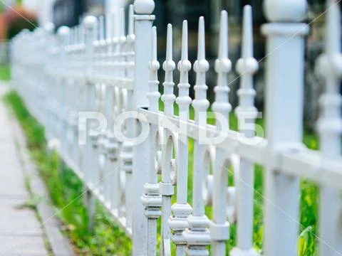 American dream, white fence near the government building Stock Photos